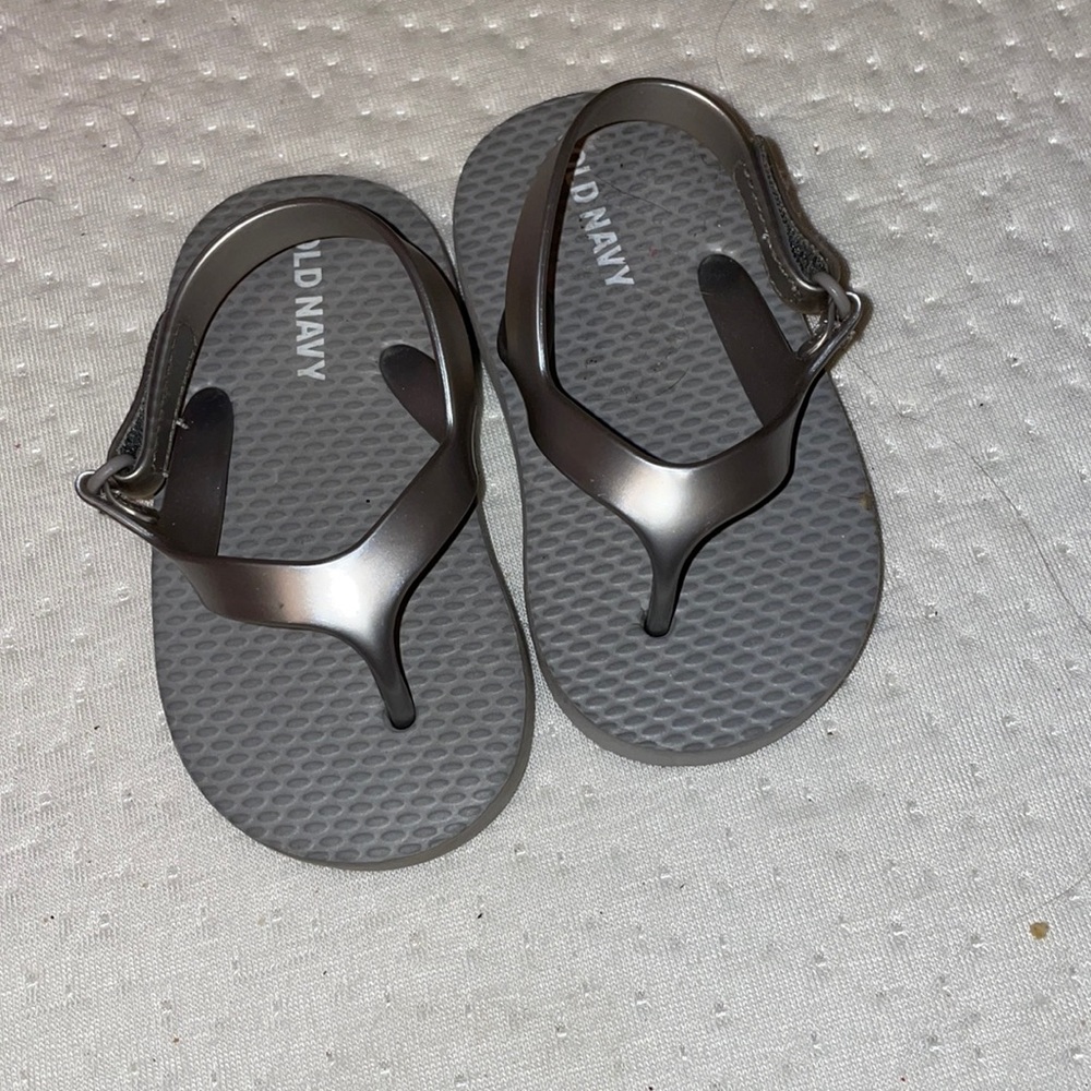 Grey flip flops